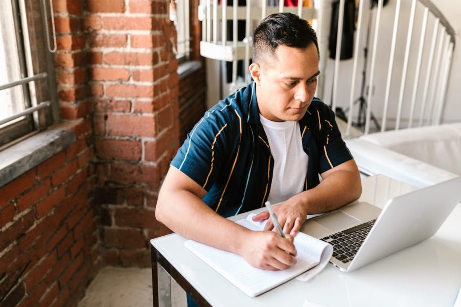 Adult man studying with laptop online learning