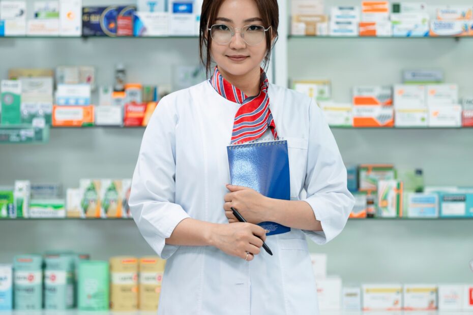 Pharmacist holding a book